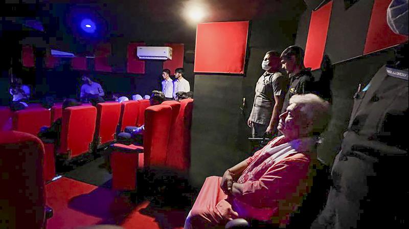 Lt Governor Manoj Singha inaugurating a cinema hall in Kashmir