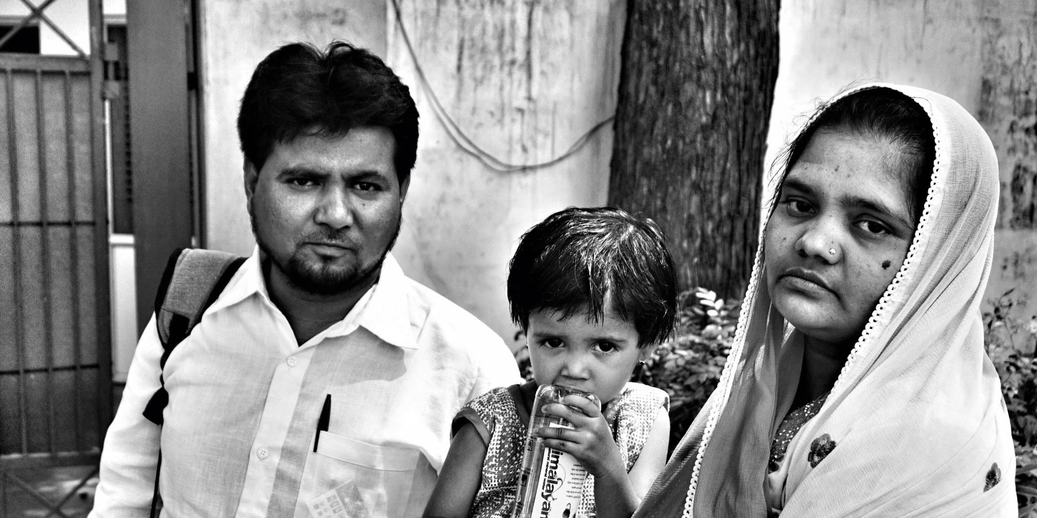 Bilkis Bano with her husband Yakoob and their daughter before the press conference in New Delhi on May 8 - Credit -Shome Basu - Wire