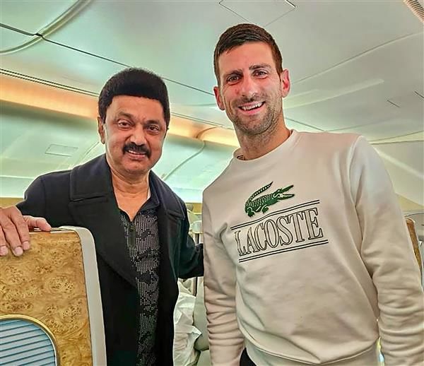 Tamil Nadu Chief Minister M K Stalin with Serbian tennis player Novak Djokovic onboard his flight to Spain - PTI Photo