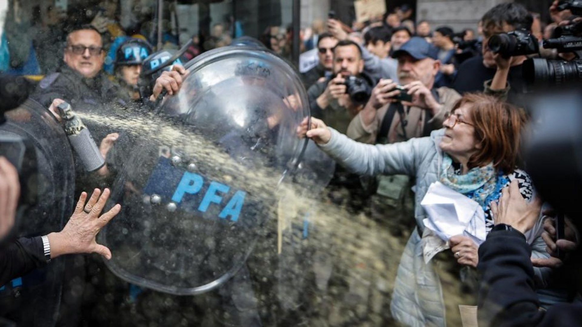 Argentina Police using pepper spray on pension demonstrators | BBC Photo