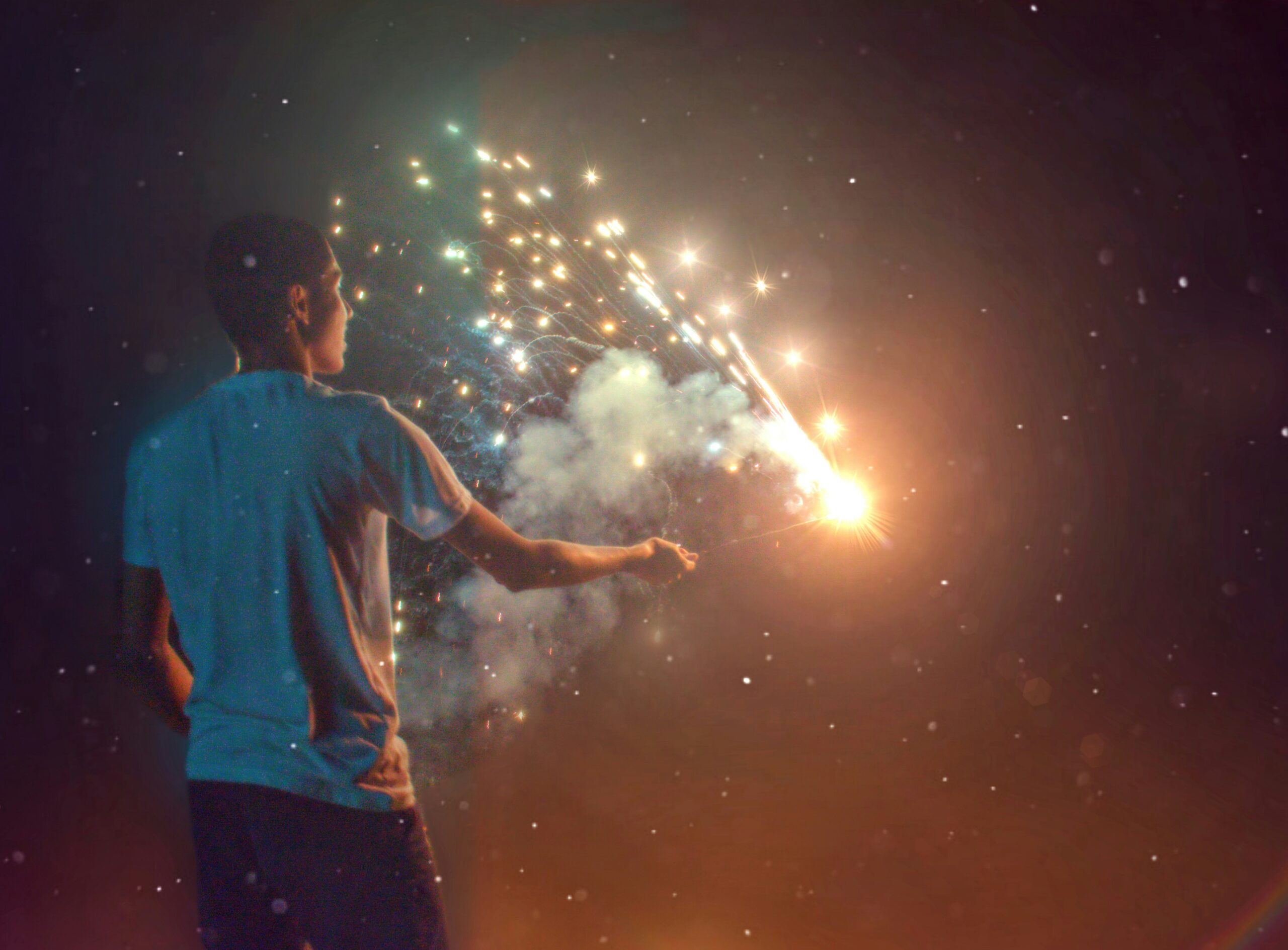 A boy lighting up a firecracker | Photo Credit: Kirstell Pauldoss